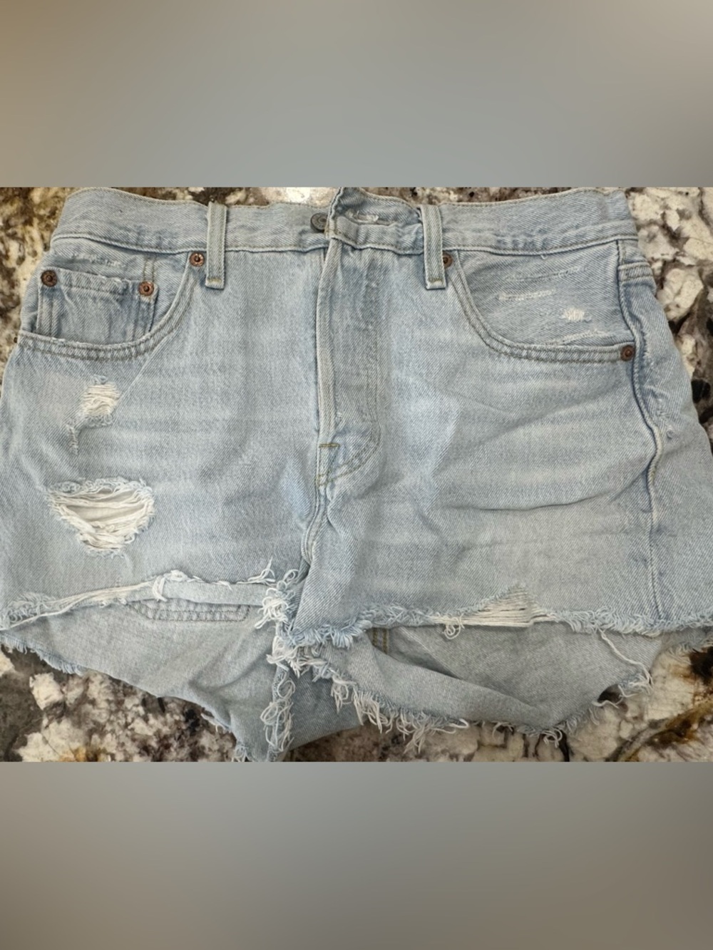 Women’s Light Blue Distressed Denim Jeans